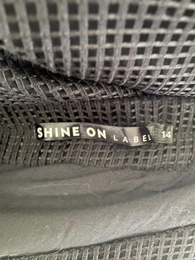 Black Shine on the label Skirts, 14