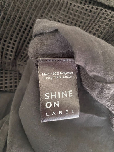 Black Shine on the label Skirts, 14